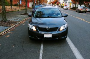 Front view of car parked in bike lane